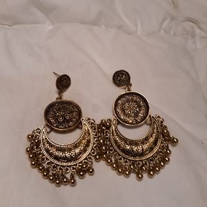 Gold boho gypsy earrings.